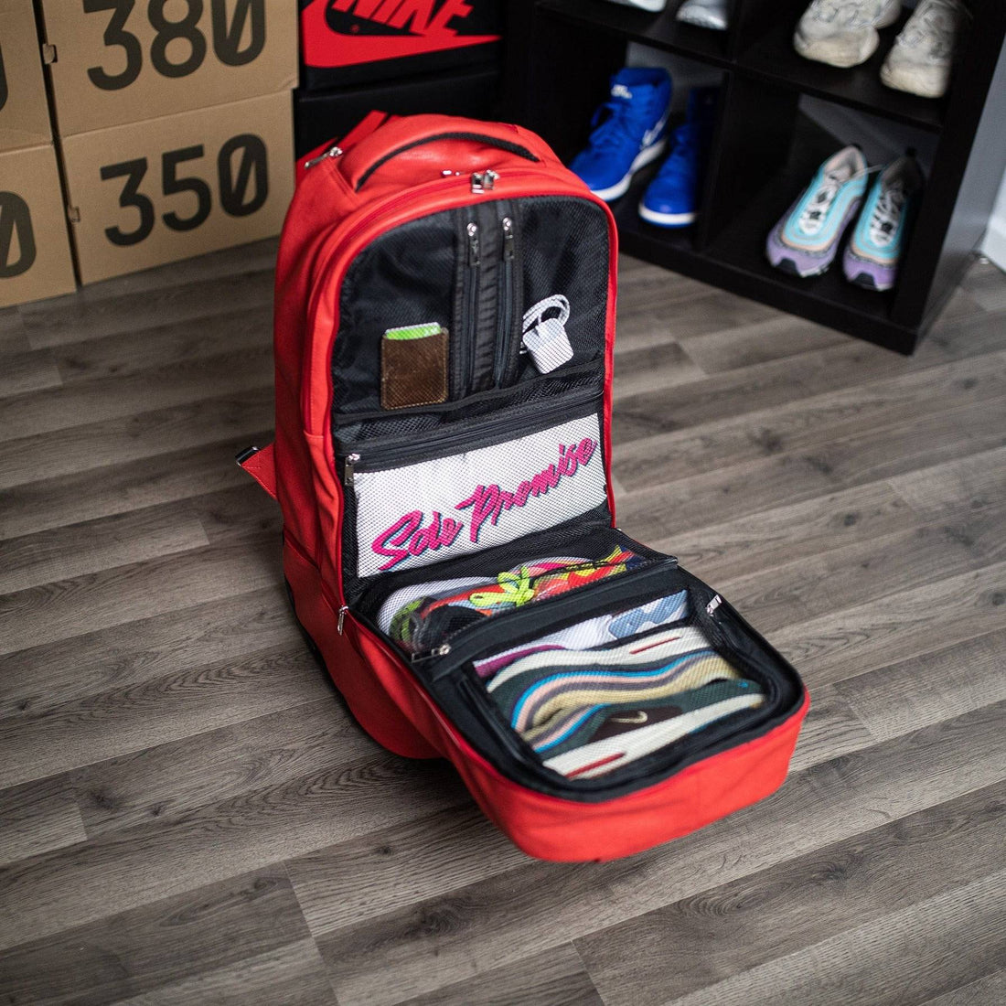 Red Leather Carry-On Roller Bag