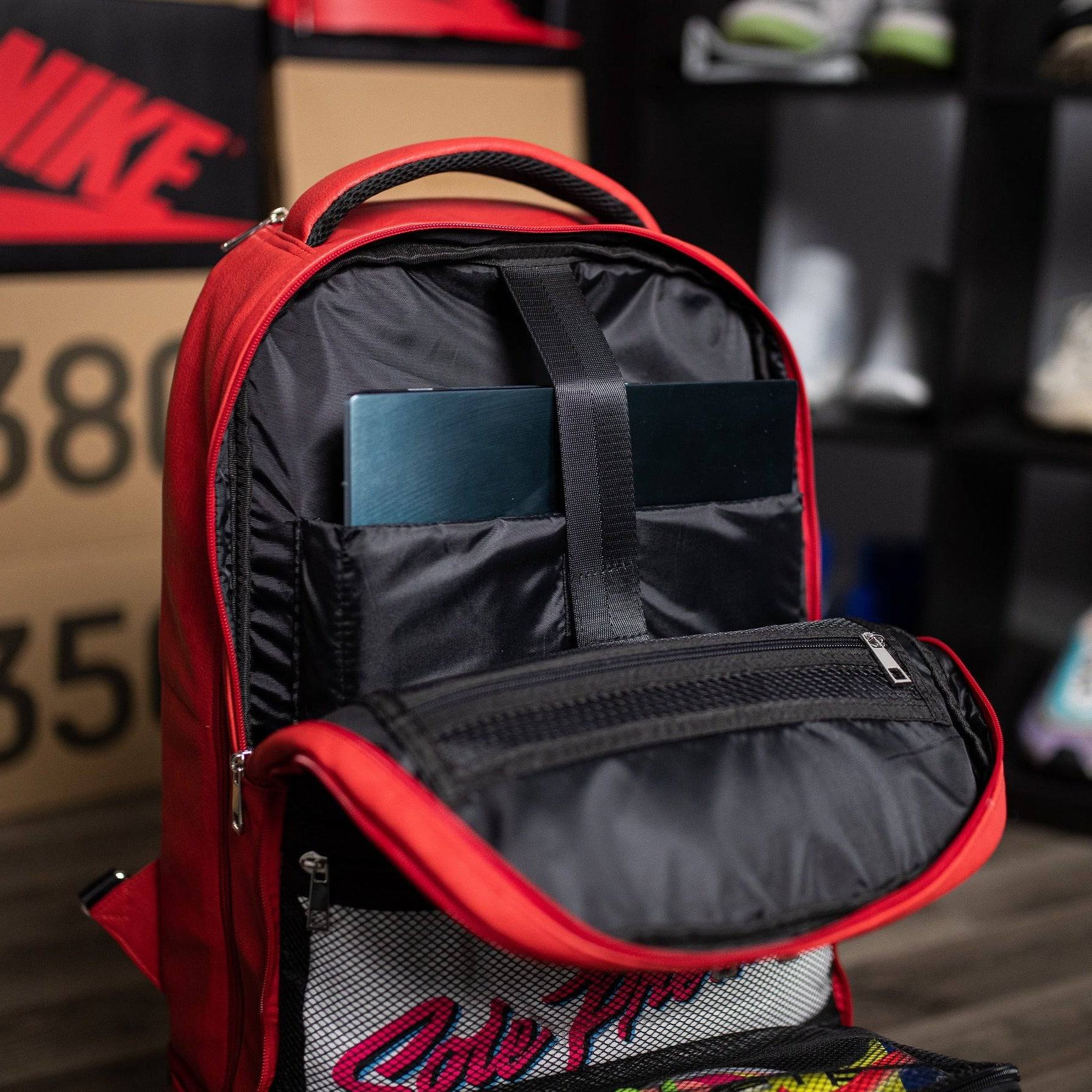 Red Leather Carry-On Roller Bag